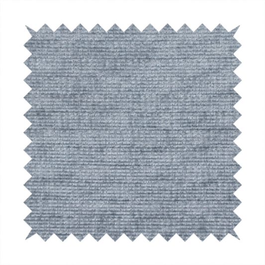 A slate grey fabric with a dense horizontal ribbed texture. The material features a plush, velvety pile with subtle mottled highlights, creating a rich, tactile surface that offers both depth and a modern, clean aesthetic.