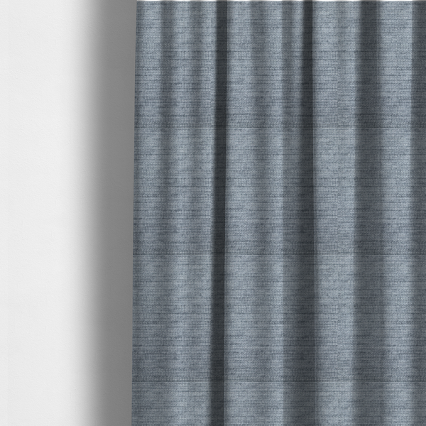 The fabric used to create these made-to-measure curtains is a slate grey fabric with a dense horizontal ribbed texture. The material features a plush, velvety pile with subtle mottled highlights, creating a rich, tactile surface that offers both depth and a modern, clean aesthetic.