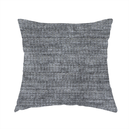 The fabric used to create this handmade cushion is a dark charcoal grey fabric with a dense horizontal ribbed texture. The weave features a soft, plush pile with subtle weathered variations, creating a multi-tonal smoky effect that adds depth and a sophisticated matte finish.