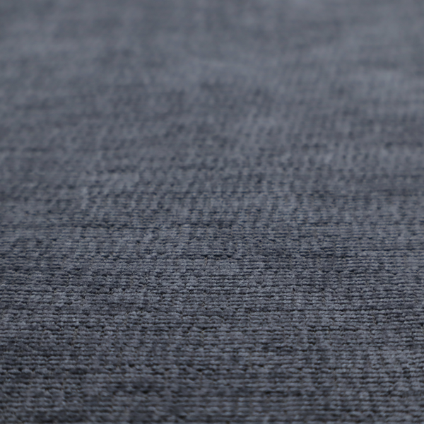 A deep navy-charcoal fabric with a dense horizontal ribbed texture. The material has a soft, plush pile that creates a subtle multi-tonal effect, blending dark midnight blue and charcoal grey tones with a durable matte finish.