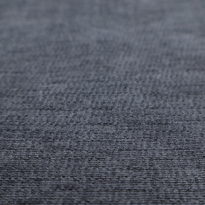 A deep navy-charcoal fabric with a dense horizontal ribbed texture. The material has a soft, plush pile that creates a subtle multi-tonal effect, blending dark midnight blue and charcoal grey tones with a durable matte finish.