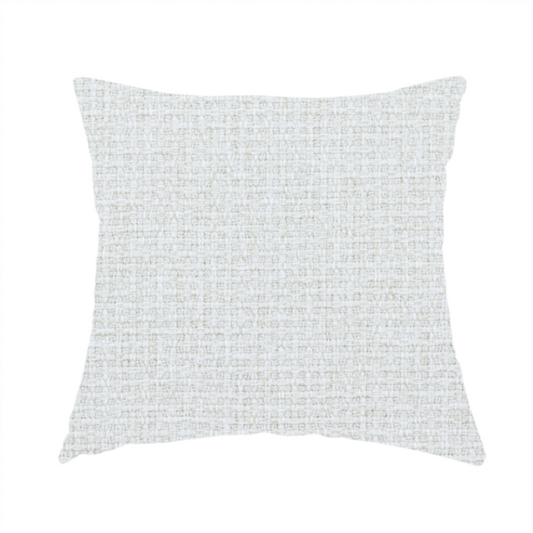 The fabric used to create these handmade cushions is a light-coloured, woven contract fabric. The material features a fine, grid-like texture resembling a mix of linen and grass cloth in a neutral off-white or pale pearl tone. The weave creates a subtle, matte geometric pattern with delicate shadows that give the surface a tactile, three-dimensional appearance.