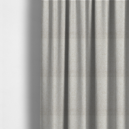 The fabric used to create these made-to-measure curtains is a warm off-white or light oatmeal shade. The textile features a dense, multi-tonal basket weave pattern with visible interlacing threads in cream and soft beige, creating a textured, linen-look surface.