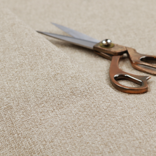 A warm sand or light tan shade. The textile features a pronounced, multi-tonal basket weave with interlocking beige and cream threads, creating a rugged yet refined linen-look texture.