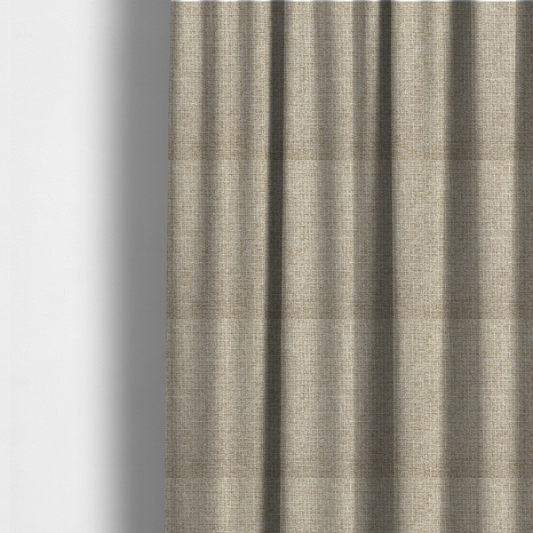The fabric used to create these made-to-measure curtains is a warm sand or light tan shade. The textile features a pronounced, multi-tonal basket weave with interlocking beige and cream threads, creating a rugged yet refined linen-look texture.