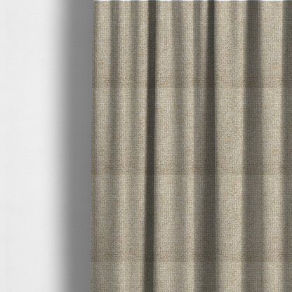 The fabric used to create these made-to-measure curtains is a warm sand or light tan shade. The textile features a pronounced, multi-tonal basket weave with interlocking beige and cream threads, creating a rugged yet refined linen-look texture.
