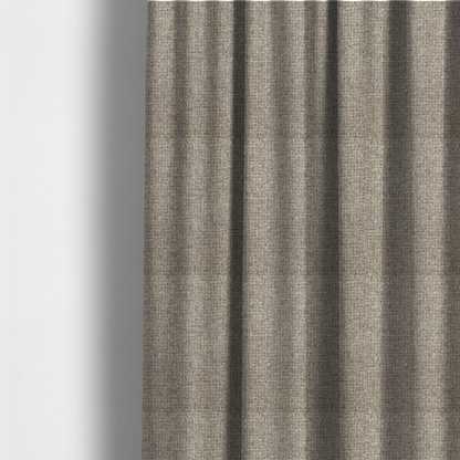 The fabric used to create these made-to-measure curtains is an upholstery fabric in a versatile taupe or mushroom shade. The textile features a dense, multi-tonal weave with interlacing fibres of cool grey, beige, and cream, creating a sophisticated textured linen-look surface.
