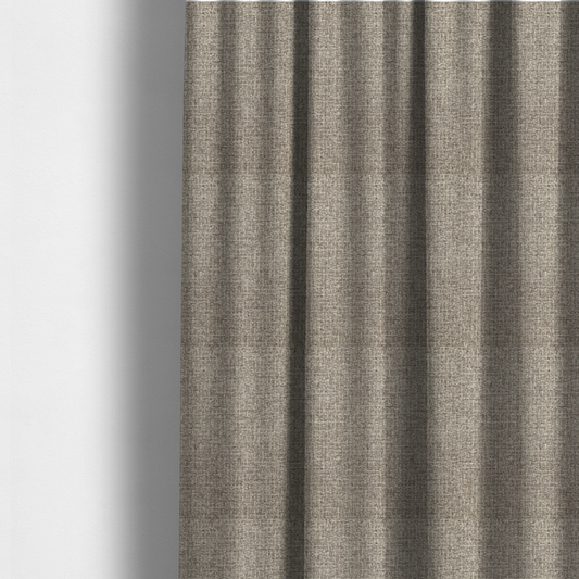 The fabric used to create these made-to-measure curtains is an upholstery fabric in a versatile taupe or mushroom shade. The textile features a dense, multi-tonal weave with interlacing fibres of cool grey, beige, and cream, creating a sophisticated textured linen-look surface.