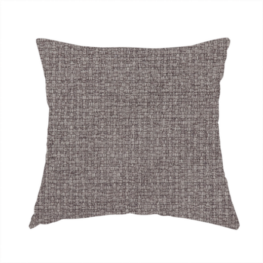 The fabric used to create this handmade cushion is a upholstery fabric in a sophisticated mink or warm grey shade. The textile features a tight, multi-tonal weave with interlacing threads of deep taupe, charcoal, and soft brown, creating a rich, textured surface with a matte finish.