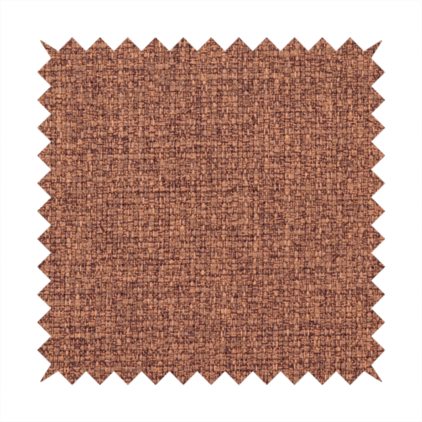 An upholstery fabric in a warm terracotta or burnt orange shade. The textile features a multi-tonal basket weave with interlacing copper and dark brown threads, creating a rich, textured linen-look surface with an earthy, matte finish.