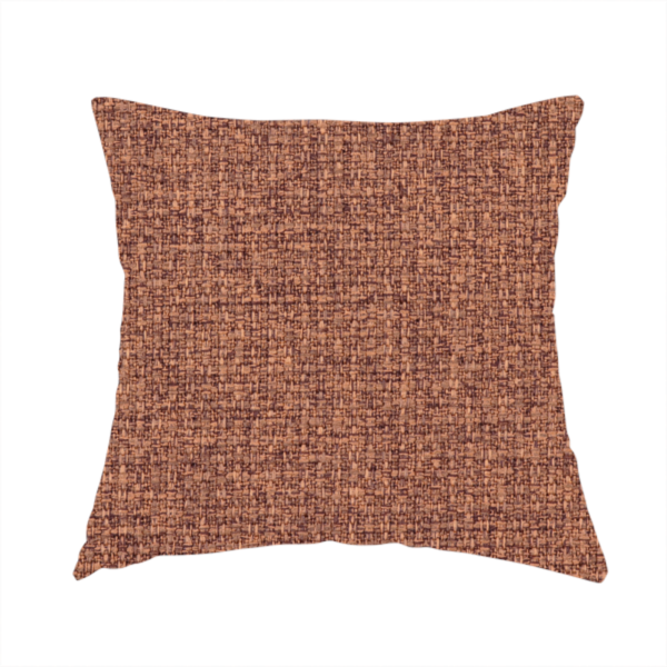 The fabric used to create this handmade cushion is a upholstery fabric in a warm terracotta or burnt orange shade. The textile features a multi-tonal basket weave with interlacing copper and dark brown threads, creating a rich, textured linen-look surface with an earthy, matte finish.