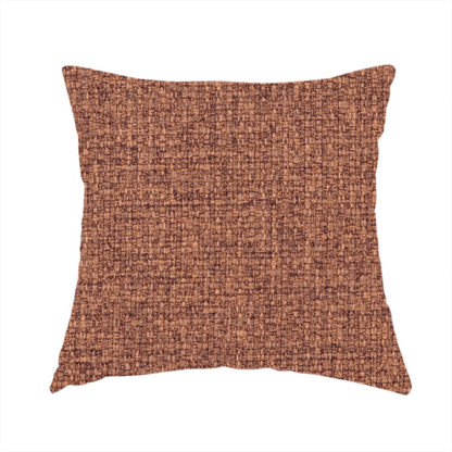 The fabric used to create this handmade cushion is a upholstery fabric in a warm terracotta or burnt orange shade. The textile features a multi-tonal basket weave with interlacing copper and dark brown threads, creating a rich, textured linen-look surface with an earthy, matte finish.