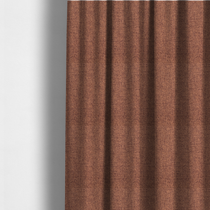 The fabric used to create these made-to-measure curtains is a upholstery fabric in a warm terracotta or burnt orange shade. The textile features a multi-tonal basket weave with interlacing copper and dark brown threads, creating a rich, textured linen-look surface with an earthy, matte finish.