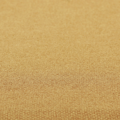 An upholstery fabric in a bright mustard or golden ochre shade. The textile features a dense, multi-tonal basket weave with interlacing threads of yellow, gold, and light tan, creating a vibrant, linen-look texture with a matte finish.