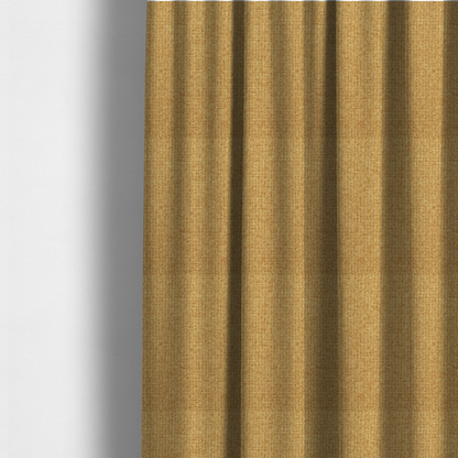 The fabric used to create these made-to-measure curtains is a upholstery fabric in a bright mustard or golden ochre shade. The textile features a dense, multi-tonal basket weave with interlacing threads of yellow, gold, and light tan, creating a vibrant, linen-look texture with a matte finish.