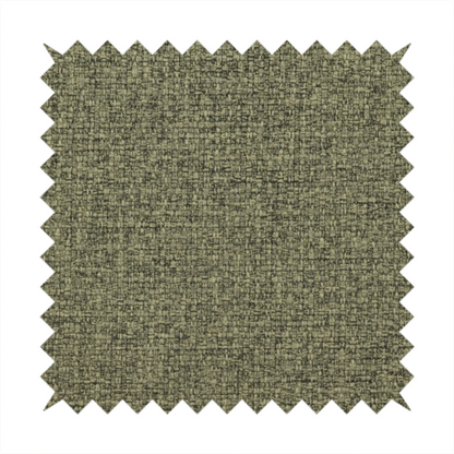 An upholstery fabric in an earthy olive or moss green shade. The textile features a dense, multi-tonal weave with interlaced threads of forest green, sage, and dark charcoal, creating a rich, textured linen-look surface with a matte finish.