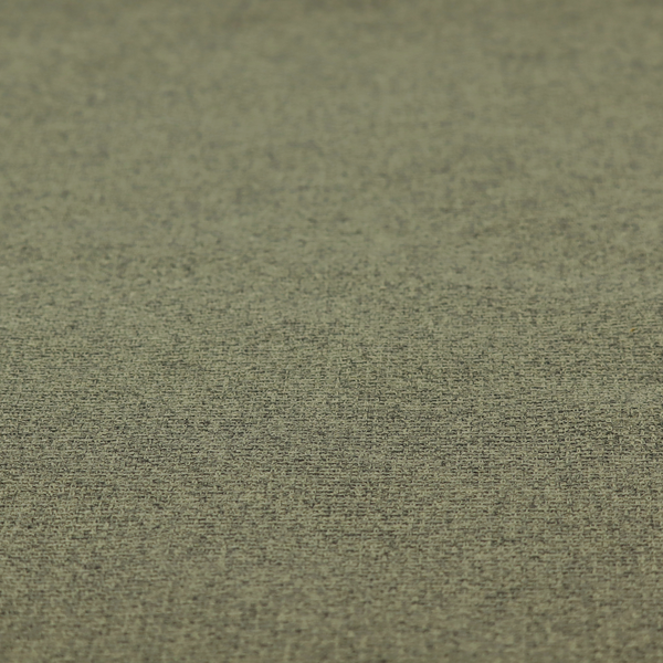 An upholstery fabric in an earthy olive or moss green shade. The textile features a dense, multi-tonal weave with interlaced threads of forest green, sage, and dark charcoal, creating a rich, textured linen-look surface with a matte finish.
