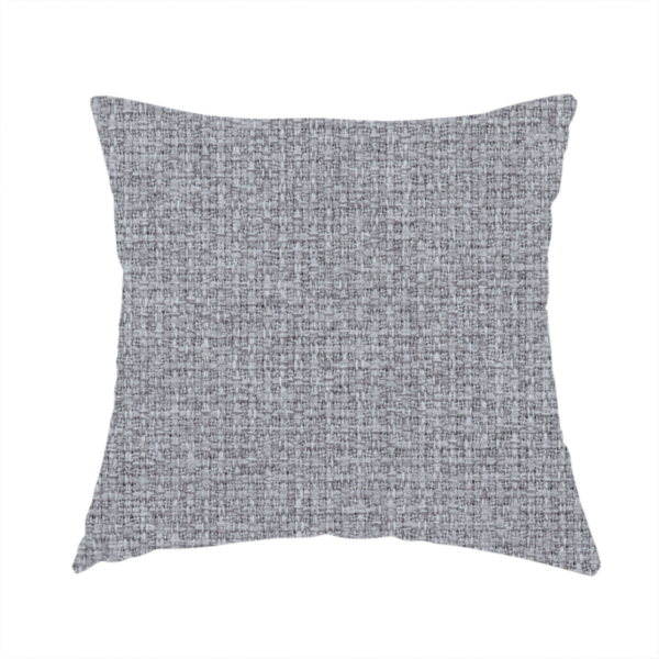 The fabric used to create this handmade cushion is a upholstery fabric in a cool pebble grey. The interlacing of light grey and off-white threads creates a clean, contemporary basket weave pattern with a matte finish.