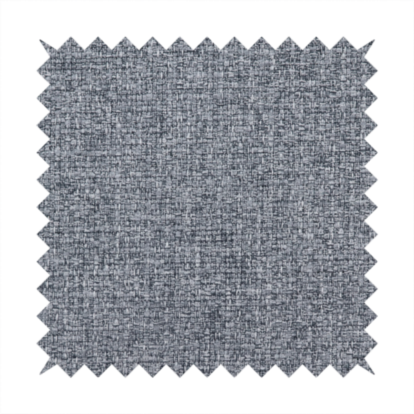 A fabric in a dark steel or charcoal grey. The high-contrast weave features interlaced light grey and deep black fibres, creating a rugged, textured surface.