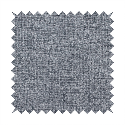 A fabric in a dark steel or charcoal grey. The high-contrast weave features interlaced light grey and deep black fibres, creating a rugged, textured surface.
