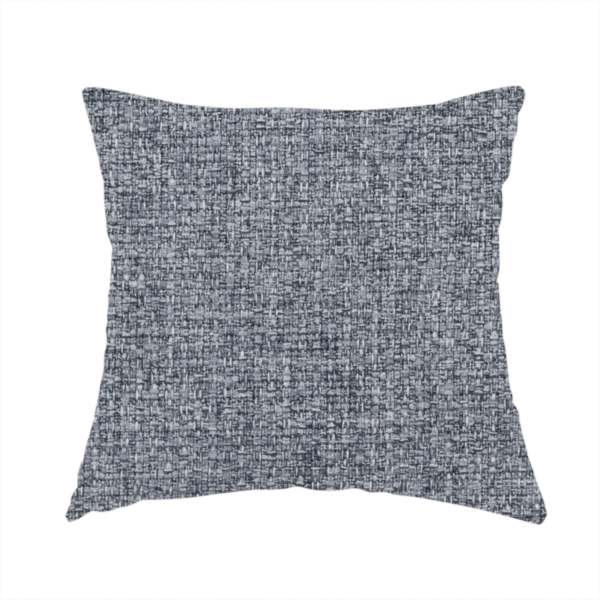 the fabric used to create this handmade cushion is a fabric in a dark steel or charcoal grey. The high-contrast weave features interlaced light grey and deep black fibres, creating a rugged, textured surface.