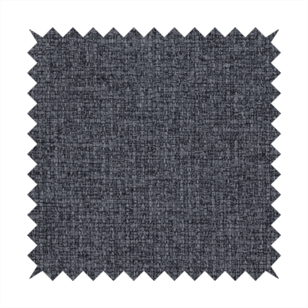 A fabric in a deep charcoal or carbon grey. The high-contrast weave features heavily interlaced black and slate grey fibres for a dense, rugged texture.