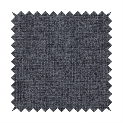 A fabric in a deep charcoal or carbon grey. The high-contrast weave features heavily interlaced black and slate grey fibres for a dense, rugged texture.