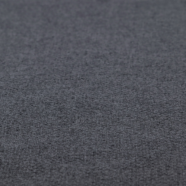 A fabric in a deep charcoal or carbon grey. The high-contrast weave features heavily interlaced black and slate grey fibres for a dense, rugged texture.