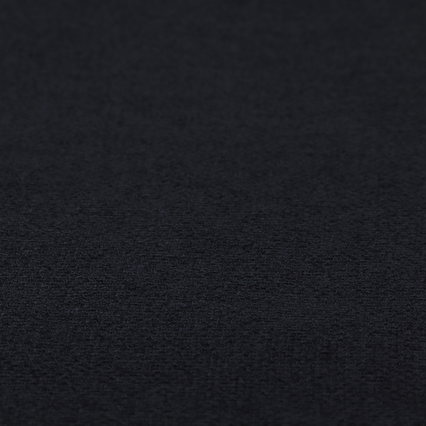 A fabric in midnight black. Dense, saturated weave of onyx and deep obsidian threads for a sleek matte finish.