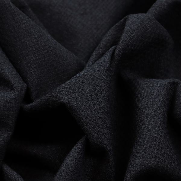 A fabric in midnight black. Dense, saturated weave of onyx and deep obsidian threads for a sleek matte finish.