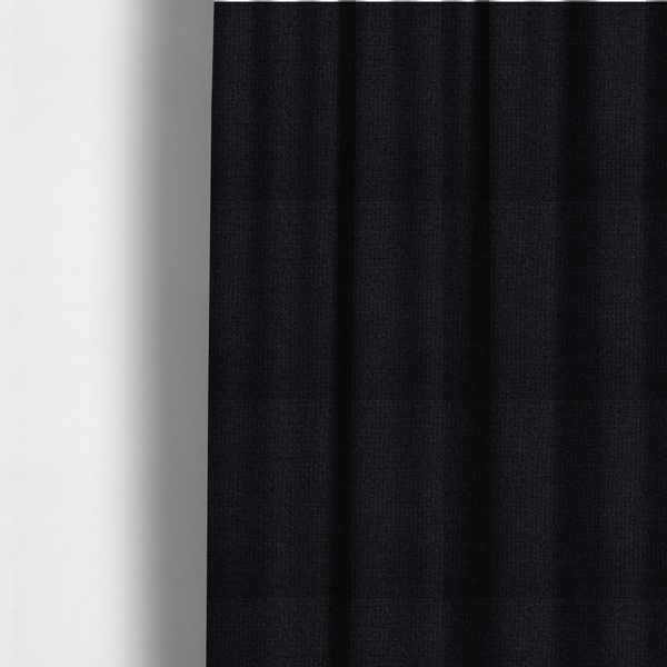 The fabric used to create these made-to-measure curtains is a fabric in midnight black. Dense, saturated weave of onyx and deep obsidian threads for a sleek matte finish.