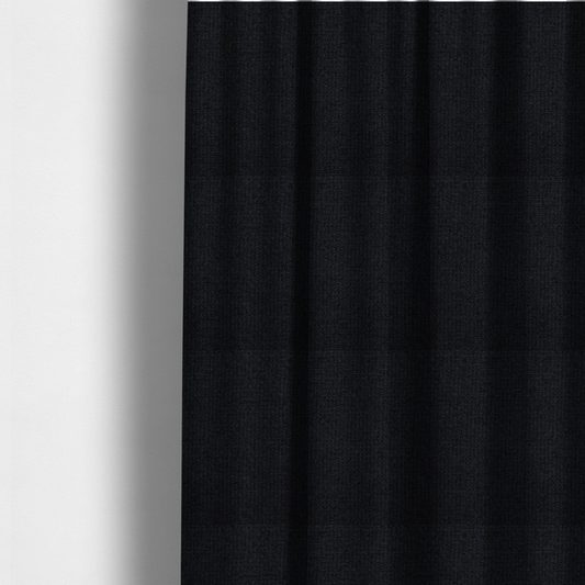 The fabric used to create these made-to-measure curtains is a fabric in midnight black. Dense, saturated weave of onyx and deep obsidian threads for a sleek matte finish.