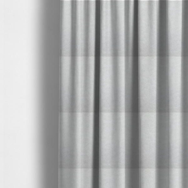 The fabric used to create these made-to-measure curtains is a off-white with a dense, felt-like or fibrous texture. The material features a subtle, marbled appearance created by a blend of pale grey and off-white fibres, giving it a soft, matte finish similar to weathered wool or industrial felt.