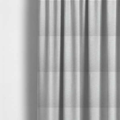 The fabric used to create these made-to-measure curtains is a off-white with a dense, felt-like or fibrous texture. The material features a subtle, marbled appearance created by a blend of pale grey and off-white fibres, giving it a soft, matte finish similar to weathered wool or industrial felt.