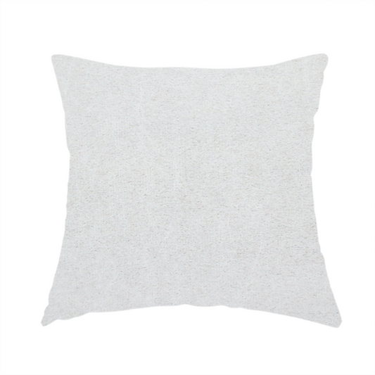 The fabric used to create this handmade cushion is a creamy off-white fabric with a dense, velvety or short-pile texture. The surface is uniform and soft, featuring a fine, grainy appearance that suggests a plush material like micro-suede or high-end upholstery velvet.