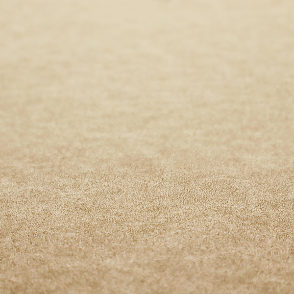 A golden-tan or sand-coloured fabric with a dense, weathered texture. The material has a soft, matte finish with a fine mottled pattern of light cream and warm brown fibres. Subtle, irregular horizontal "crackle" lines or faint creases run throughout the surface, giving it the weathered appearance of distressed suede or pressed wool.