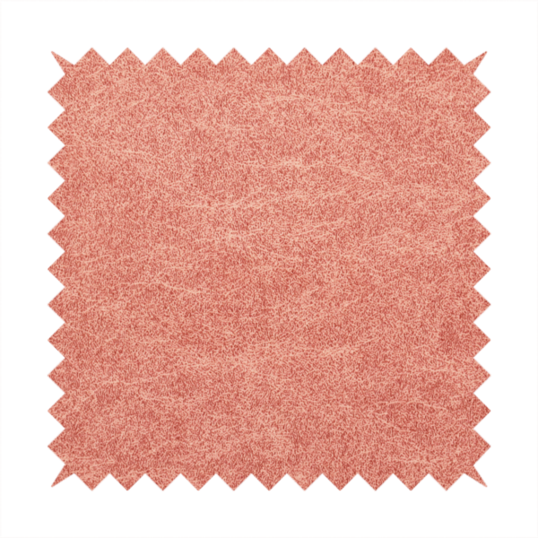 A terracotta or muted coral fabric with a rich, distressed texture. The material features a fine, stippled blend of reddish-clay tones and lighter peachy fibres. It is characterized by faint, irregular light-coloured "crackle" lines that give it the appearance of weathered suede, microfiber, or industrial felt.