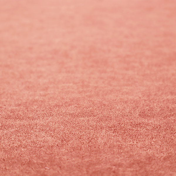 A terracotta or muted coral fabric with a rich, distressed texture. The material features a fine, stippled blend of reddish-clay tones and lighter peachy fibres. It is characterized by faint, irregular light-coloured "crackle" lines that give it the appearance of weathered suede, microfiber, or industrial felt.