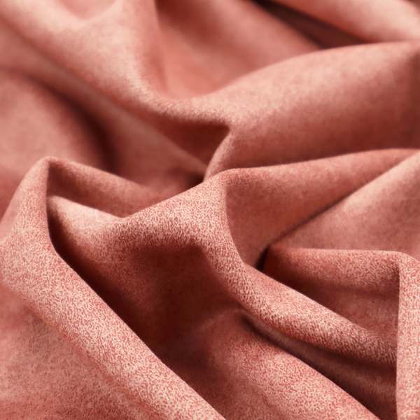 A terracotta or muted coral fabric with a rich, distressed texture. The material features a fine, stippled blend of reddish-clay tones and lighter peachy fibres. It is characterized by faint, irregular light-coloured "crackle" lines that give it the appearance of weathered suede, microfiber, or industrial felt.
