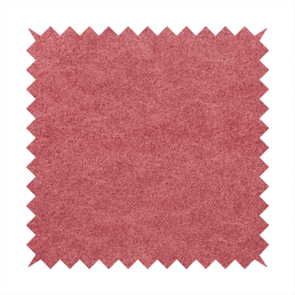 A deep rose or berry-red fabric with a rich, distressed felt-like texture. The surface features a fine, stippled pattern of muted red and soft pink fibres, creating a weathered effect. Delicate, irregular light-coloured "crackle" lines run throughout, giving it an organic, weathered look similar to suede or industrial-grade wool.