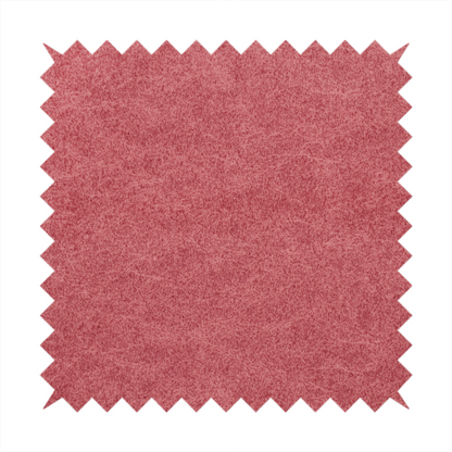 A deep rose or berry-red fabric with a rich, distressed felt-like texture. The surface features a fine, stippled pattern of muted red and soft pink fibres, creating a weathered effect. Delicate, irregular light-coloured "crackle" lines run throughout, giving it an organic, weathered look similar to suede or industrial-grade wool.