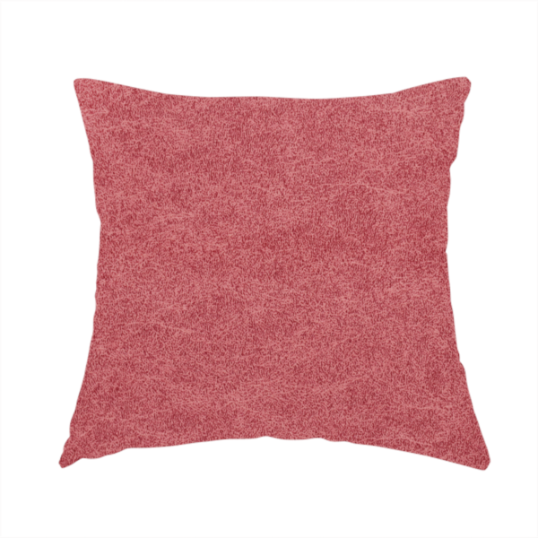 The fabric used to create this handmade cushion is a deep rose or berry-red fabric with a rich, distressed felt-like texture. The surface features a fine, stippled pattern of muted red and soft pink fibres, creating a weathered effect. Delicate, irregular light-coloured "crackle" lines run throughout, giving it an organic, weathered look similar to suede or industrial-grade wool.