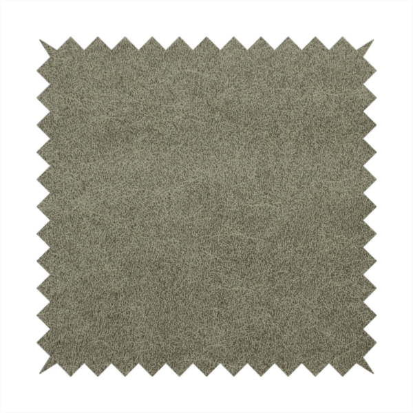 An olive-drab or sage-green fabric with a rich, distressed texture. The material features a dense, mottled pattern where dark earthy green fibres are interspersed with lighter, pale-green highlights. Like others in this series, it is characterized by faint, irregular light-coloured "crackle" lines that give it the appearance of weathered suede or industrial felt.