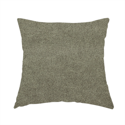 The fabric used to create these handmade cushions is a olive-drab or sage-green fabric with a rich, distressed texture. The material features a dense, mottled pattern where dark earthy green fibres are interspersed with lighter, pale-green highlights. Like others in this series, it is characterized by faint, irregular light-coloured "crackle" lines that give it the appearance of weathered suede or industrial felt.