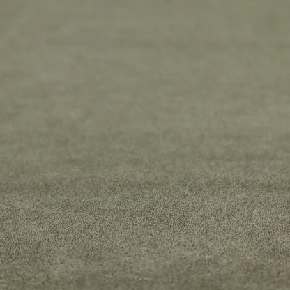 An olive-drab or sage-green fabric with a rich, distressed texture. The material features a dense, mottled pattern where dark earthy green fibres are interspersed with lighter, pale-green highlights. Like others in this series, it is characterized by faint, irregular light-coloured "crackle" lines that give it the appearance of weathered suede or industrial felt.
