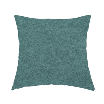 The fabric used to create these handmade cushions is a teal or dark seafoam green fabric with a dense, distressed felt-like texture. The surface features an intricate mottled pattern of deep blue-green fibres mixed with lighter cyan highlights. It contains the signature irregular, light-coloured "crackle" veins seen throughout this collection, giving it the weathered appearance of premium distressed suede or heavy-duty wool.