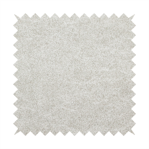 A pale greige or parchment-coloured fabric with a dense, distressed felt-like texture. The surface features a subtle mottled pattern of light cream and soft grey fibres, creating a clean, weathered look. Like the others in this collection, it includes irregular, light-coloured "crackle" lines that give it the weathered appearance of distressed suede or pressed wool.