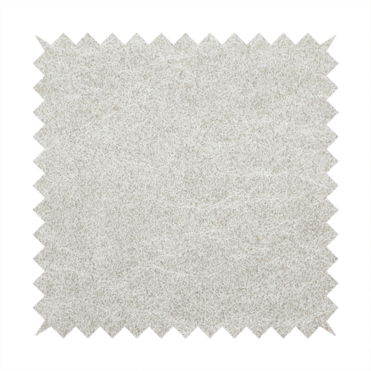 A pale greige or parchment-coloured fabric with a dense, distressed felt-like texture. The surface features a subtle mottled pattern of light cream and soft grey fibres, creating a clean, weathered look. Like the others in this collection, it includes irregular, light-coloured "crackle" lines that give it the weathered appearance of distressed suede or pressed wool.