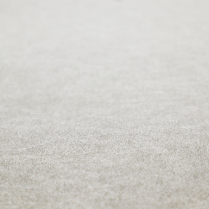 A pale greige or parchment-coloured fabric with a dense, distressed felt-like texture. The surface features a subtle mottled pattern of light cream and soft grey fibres, creating a clean, weathered look. Like the others in this collection, it includes irregular, light-coloured "crackle" lines that give it the weathered appearance of distressed suede or pressed wool.