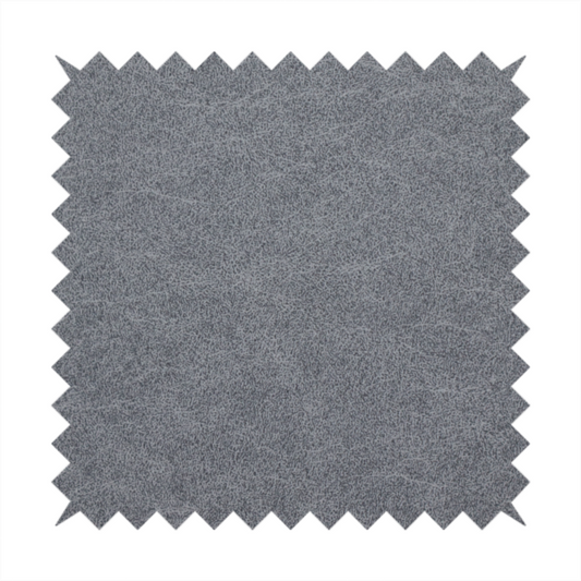 A charcoal or slate grey fabric with a rich, distressed felt-like texture. The surface features an intricate, stippled pattern of deep grey fibres mixed with lighter silver highlights. It is characterized by organic, vein-like distressing and light-coloured crackle lines, mimicking the look of weathered leather or heavy-duty industrial felt.